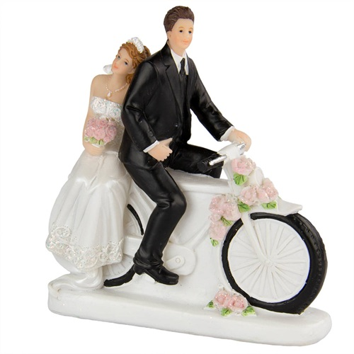 Taarttopper bruidspaar op fiets